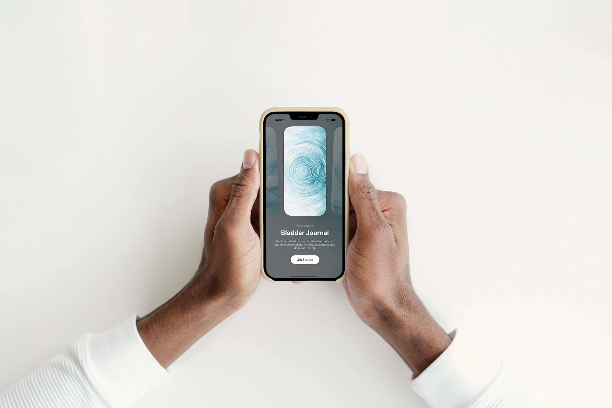 Hands holding an iPhone showing the Bladder Journal welcome screen